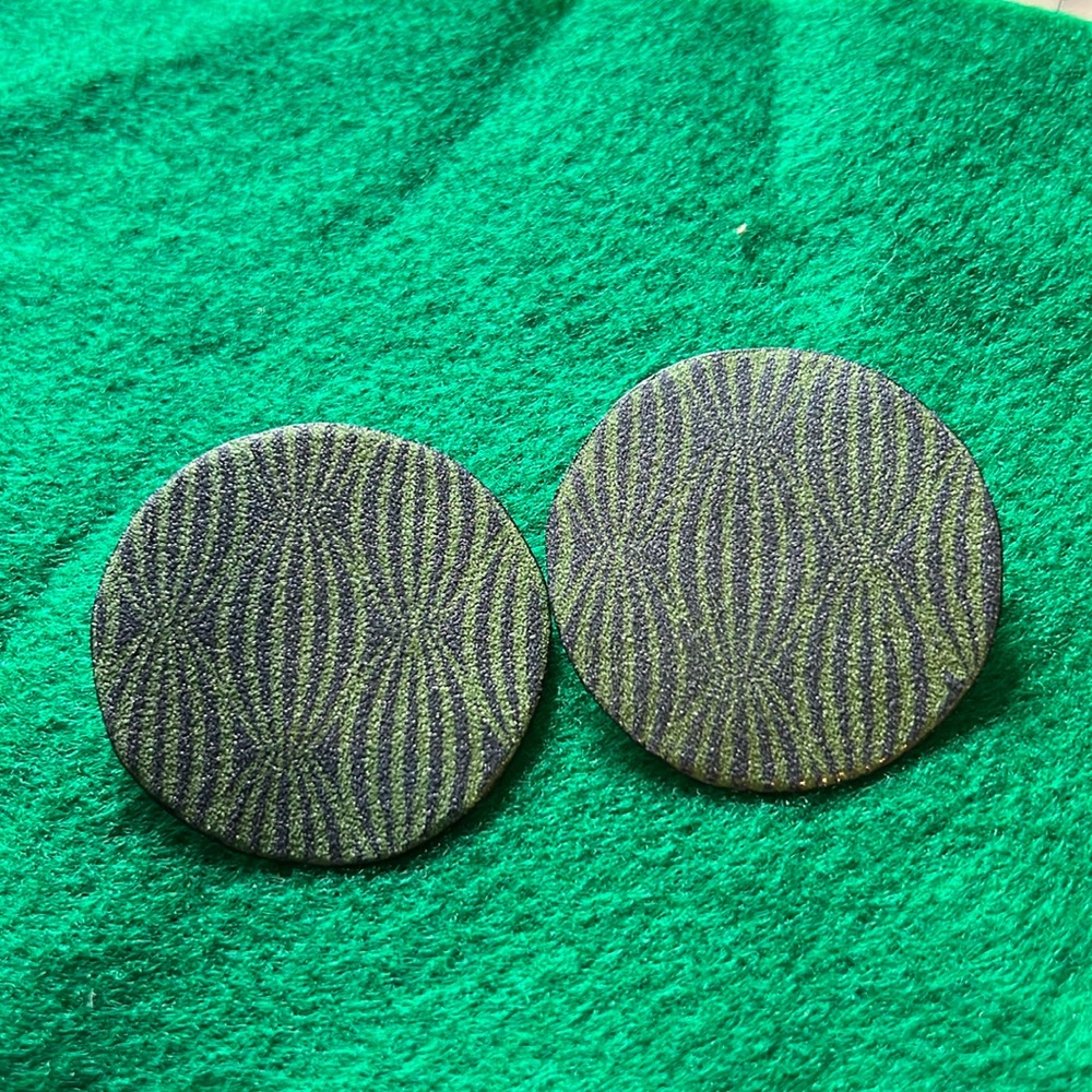 Beautiful green patterned enamel earrings. 2”